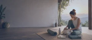 How to Prepare for Yoga Teacher Training Home How to Prepare for Yoga Teacher Training :Student preparing for Yoga Teacher Training by reviewing notes with a yoga mat, journal, books, and water bottle in a calm yoga space.