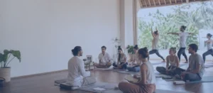 Yoga Teacher Training Experience in the first week with students learning, practicing, and listening in a peaceful yoga shala