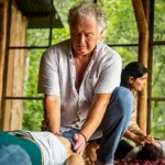 Jan Baas teaching a yoga session during a yoga retreat in Portugal