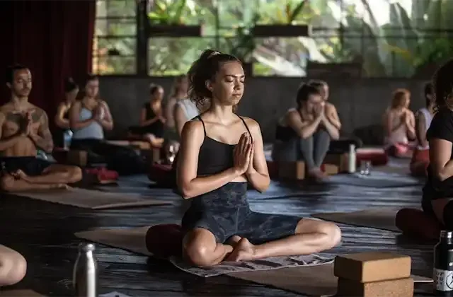 Hybrid yoga teacher training program by The Peaceful Warriors Yoga with online study and Bali training